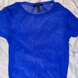 See through blue shirt!